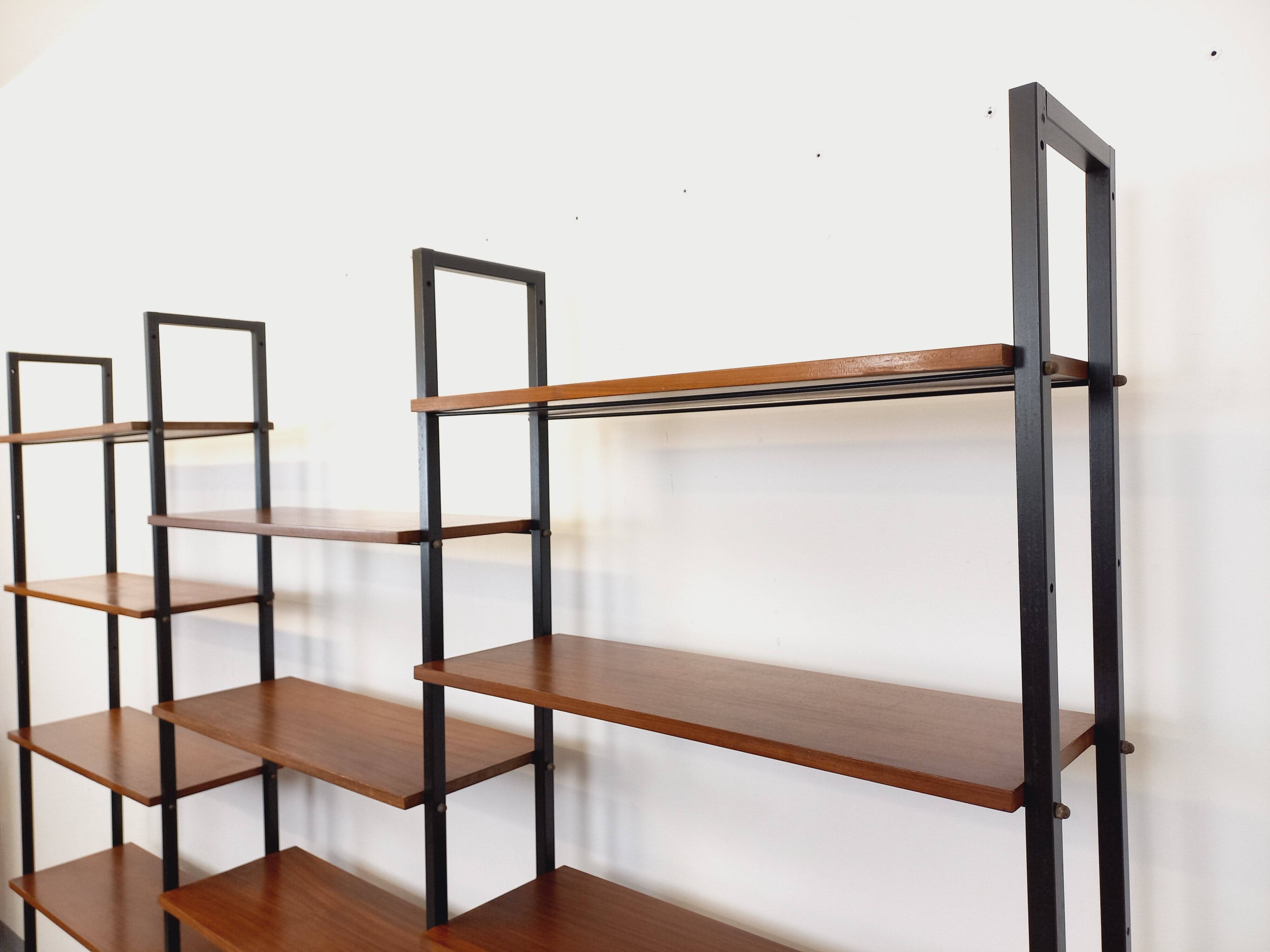 Vintage Italian triple modular bookshelf in teak and metal.
