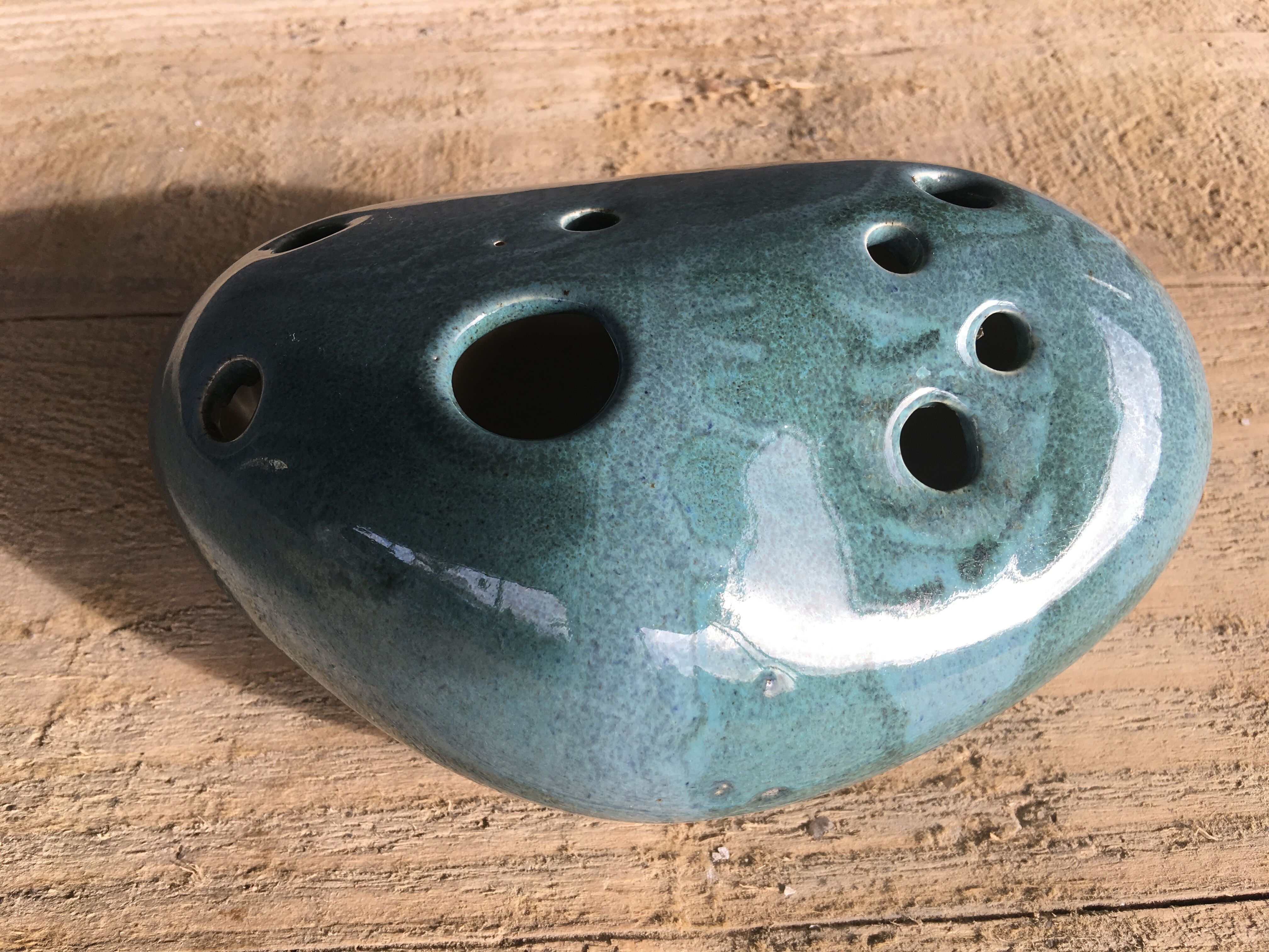 Roller spike flowers, blue-green ceramics