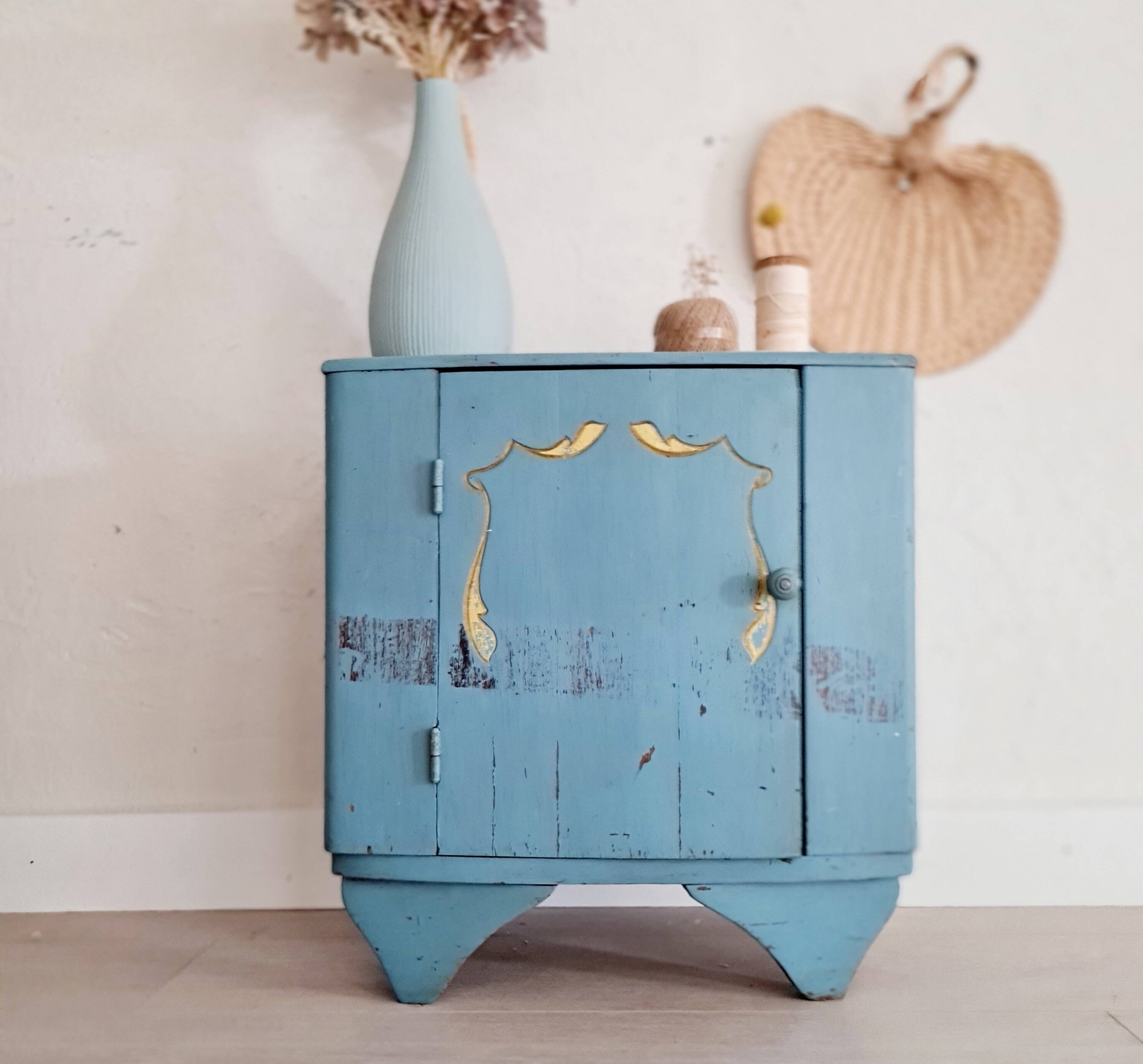 Old blue wood bedside table