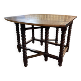 Wooden table with gateleg flaps