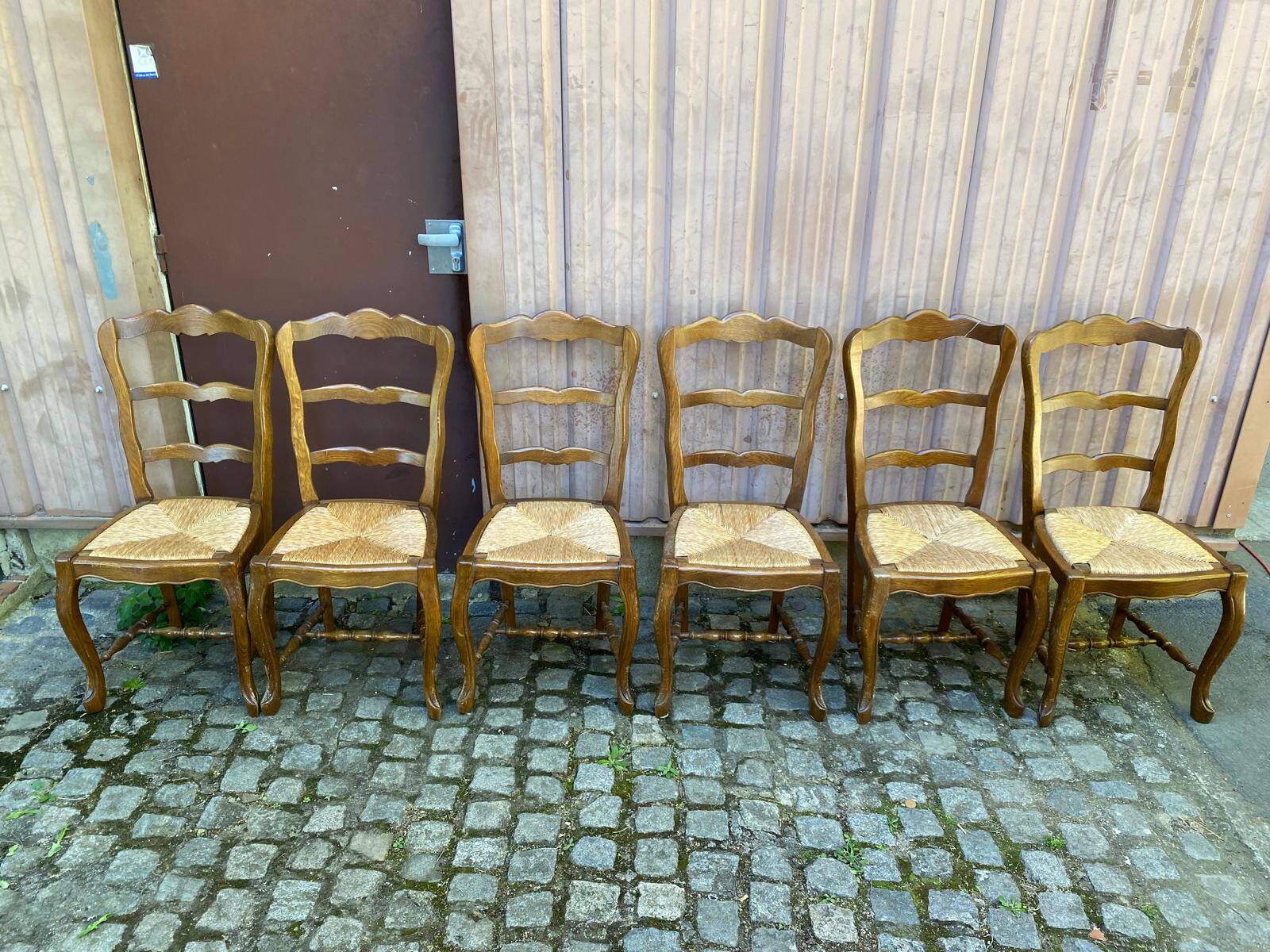 6 vintage Louis XV dining chairs with rush seats from the 20th century.