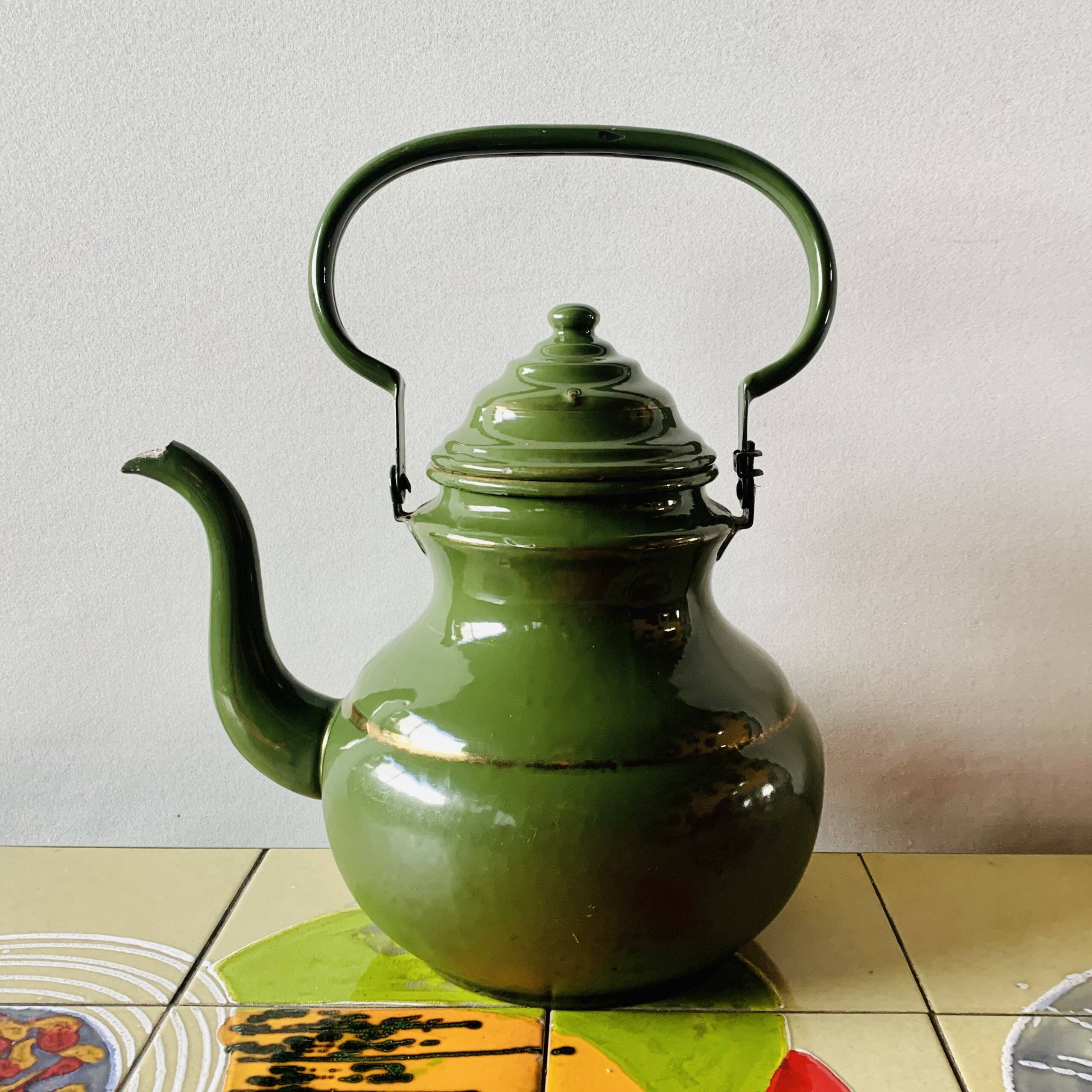 Vintage green enameled sheet metal kettle