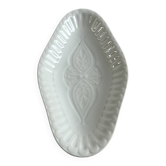 Oval white porcelain ramekin — raised floral pattern