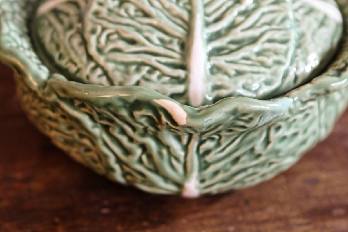 Covered pot in slip, collard greens