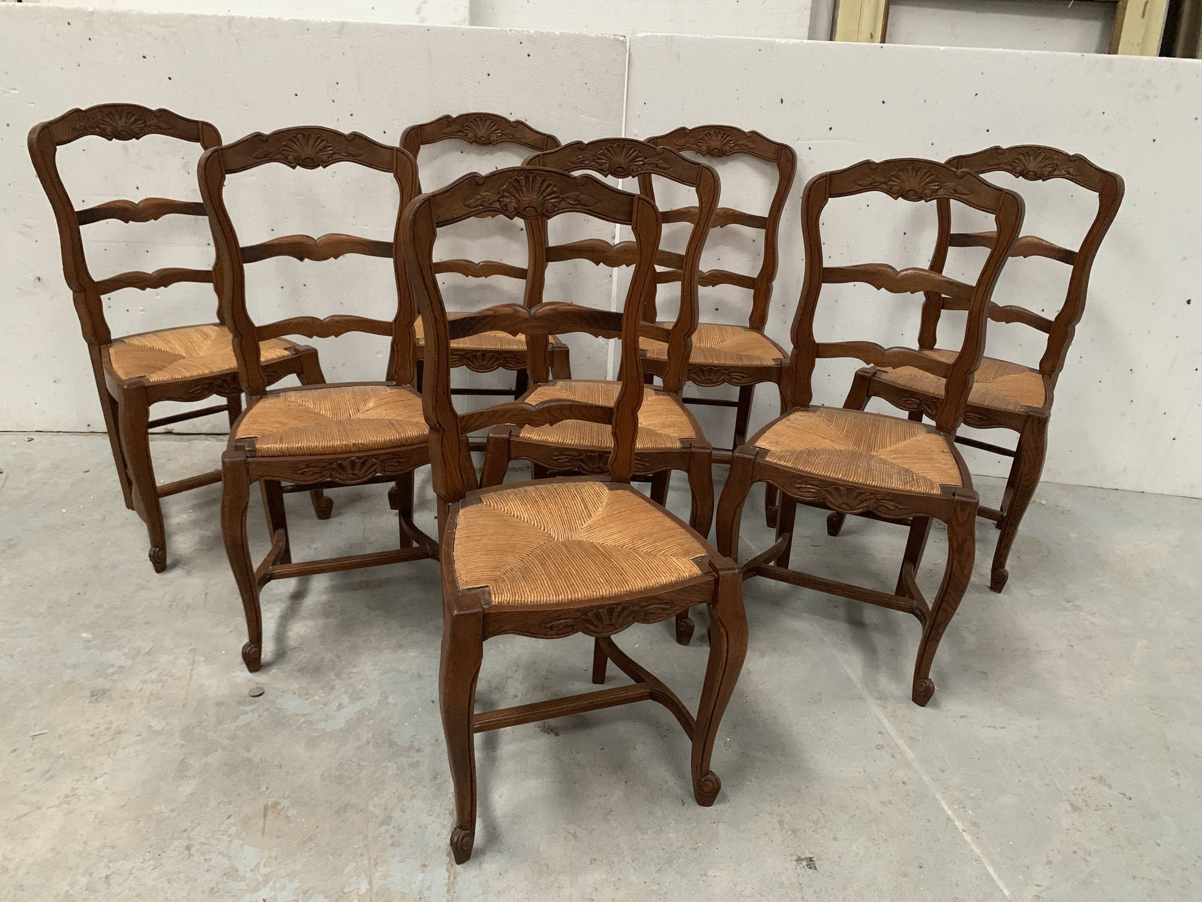 Set of eight 20th-century Regency-style chairs in solid oak