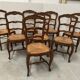 Set of eight 20th-century Regency-style chairs in solid oak