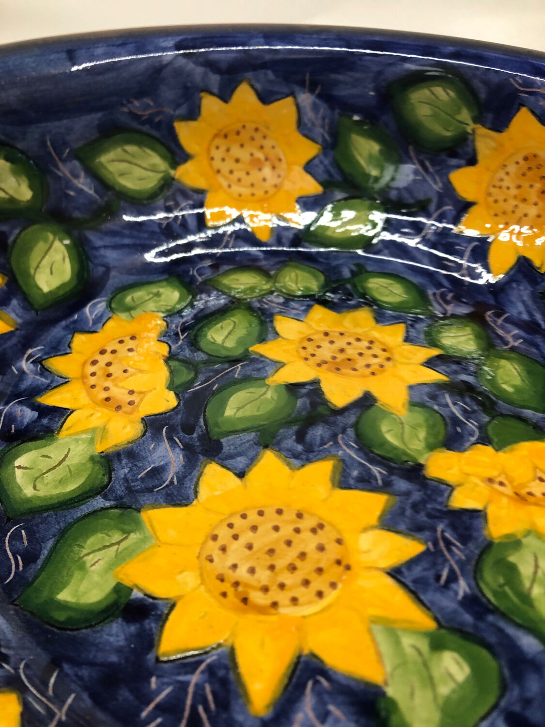 Portuguese ceramic dish decorated with sunflowers