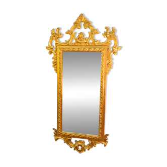 Miroir biseauté rocaille en bois doré