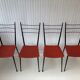 Red metal chairs from the 60s