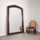 Large mirror (2 metres) Art Nouveau in carved mahogany with high-relief decoration.
