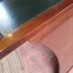 Wall-mounted writing table in cherry wood. retractable.