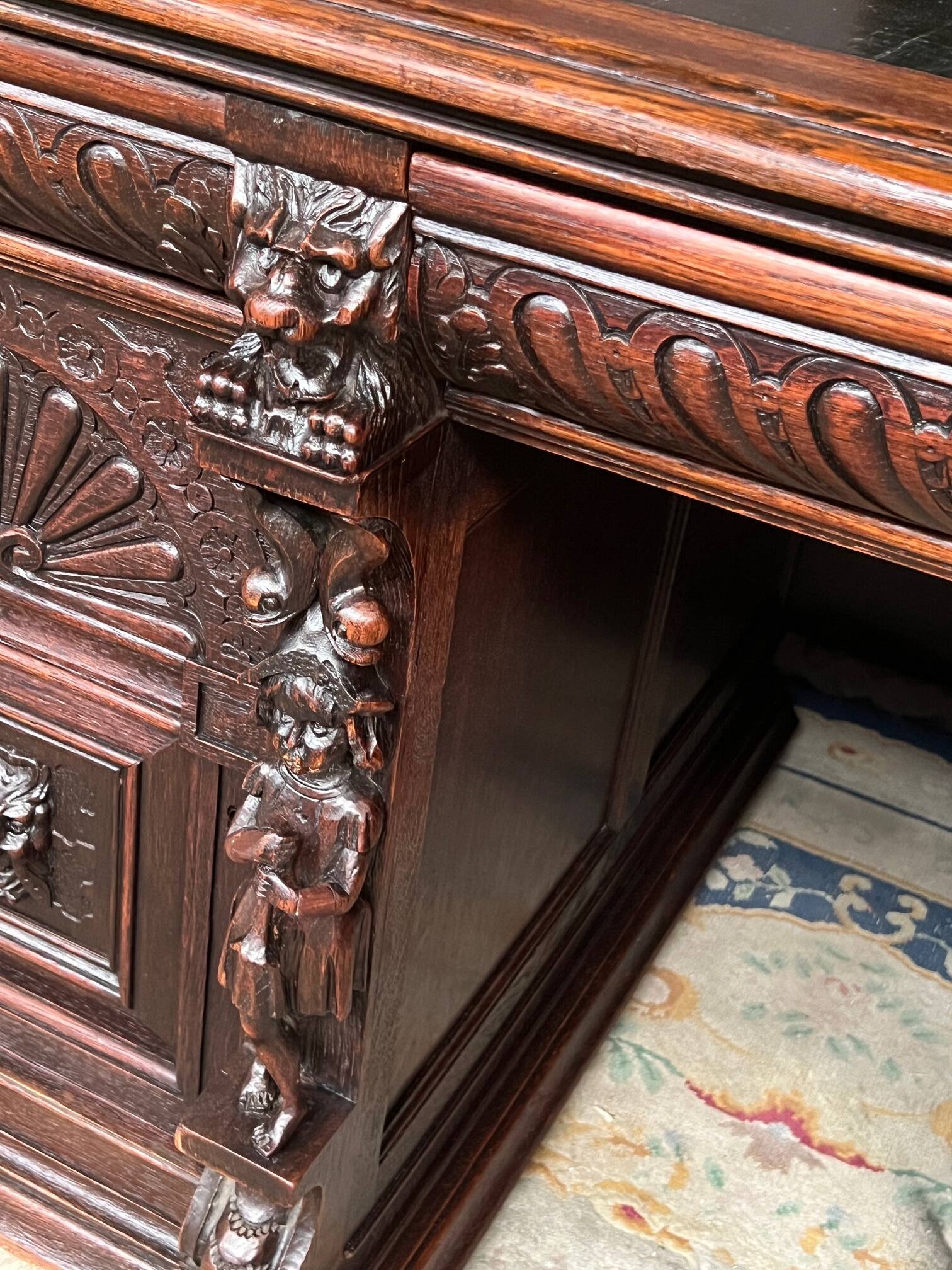 Old Renaissance style desk. Solid oak. France. Late 19th century.