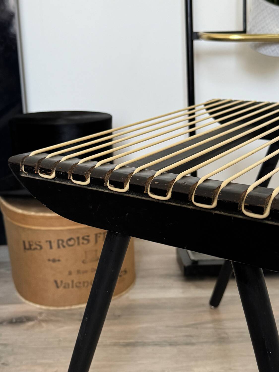 Vintage black Georges Tigien stool