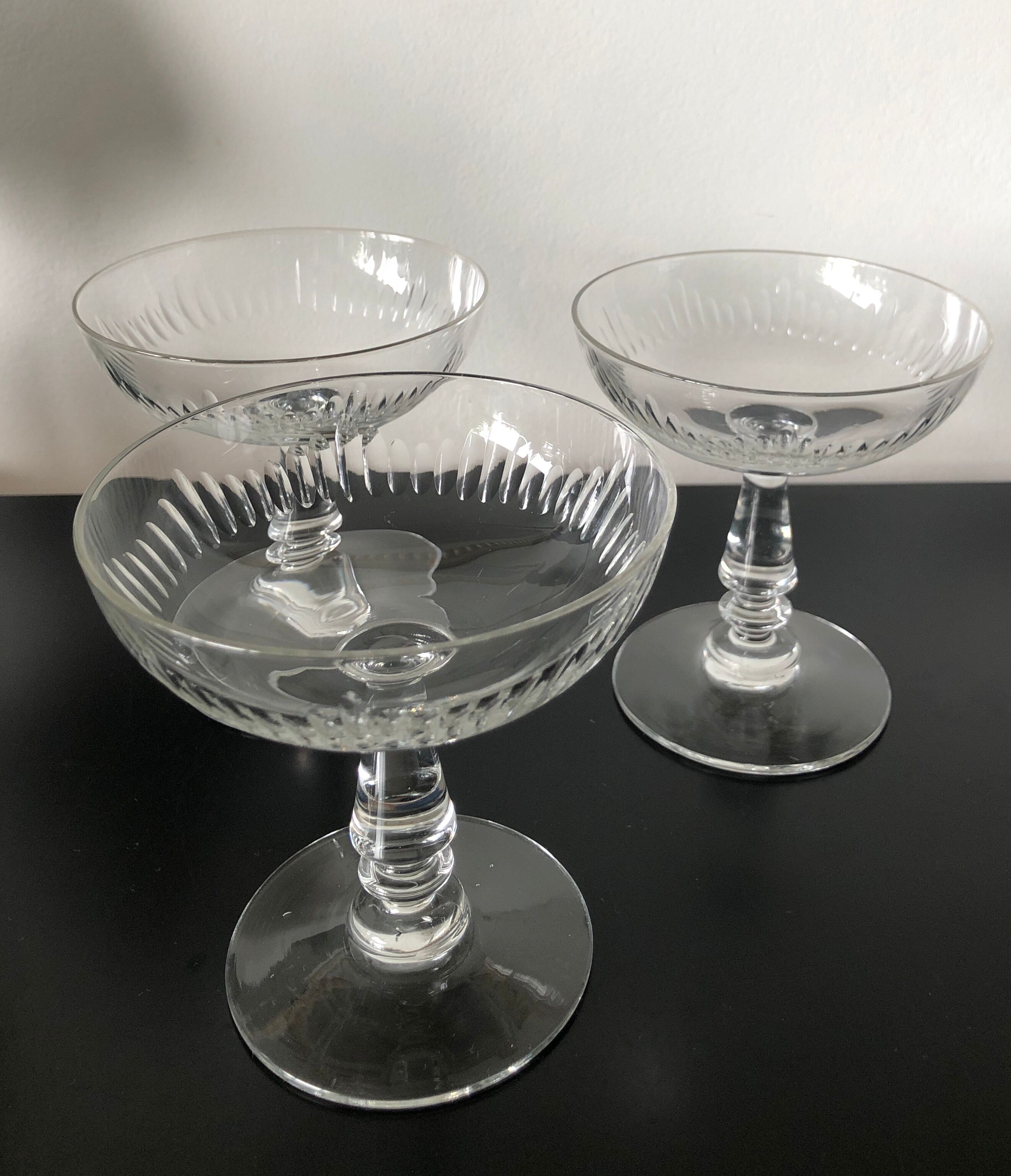 4 glasses of carved crystal champagne