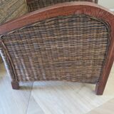 2 colonial-style armchairs in woven rattan and exotic wood