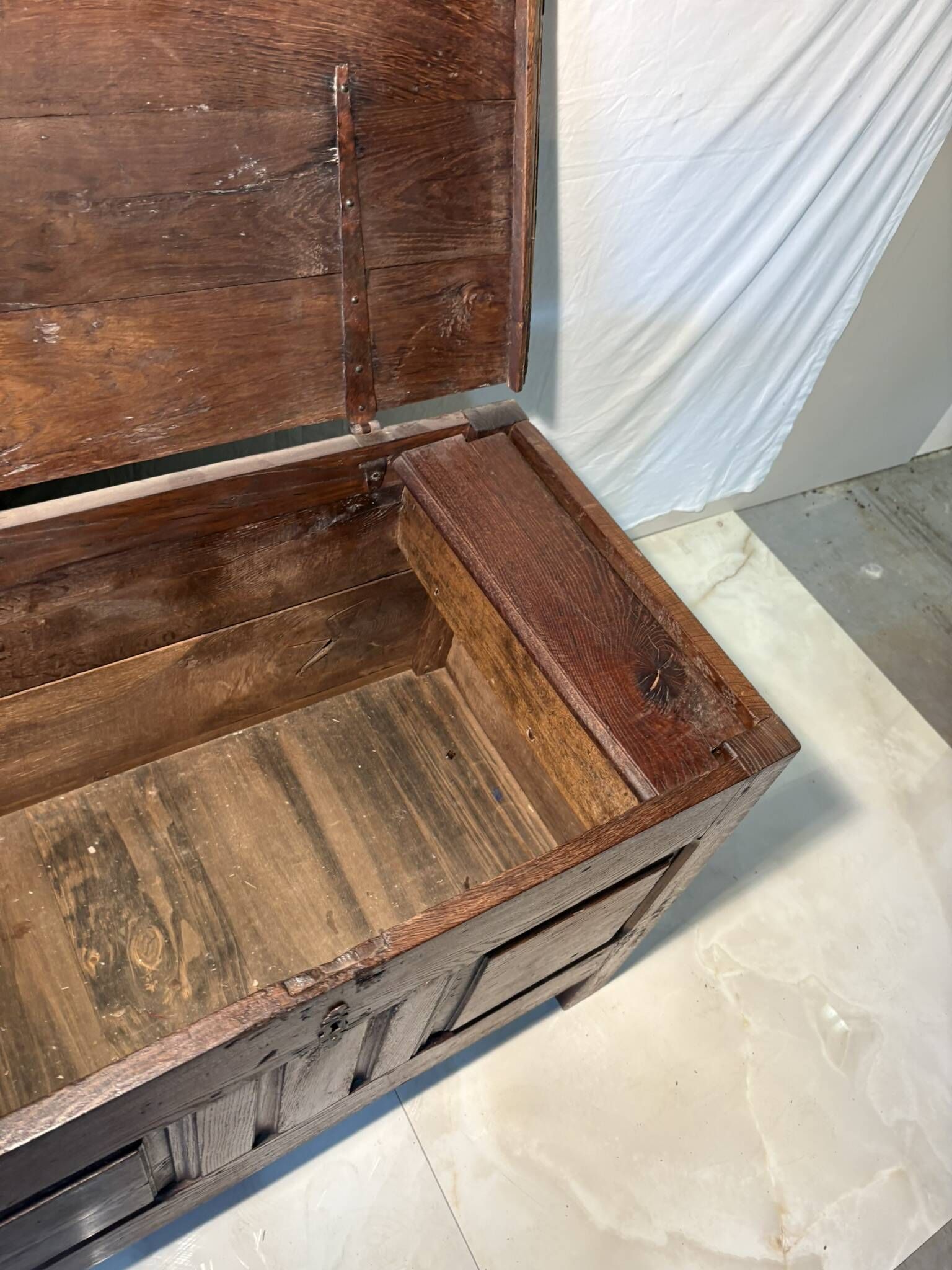 Rustic antique oak chest, original fittings and moulded panels.