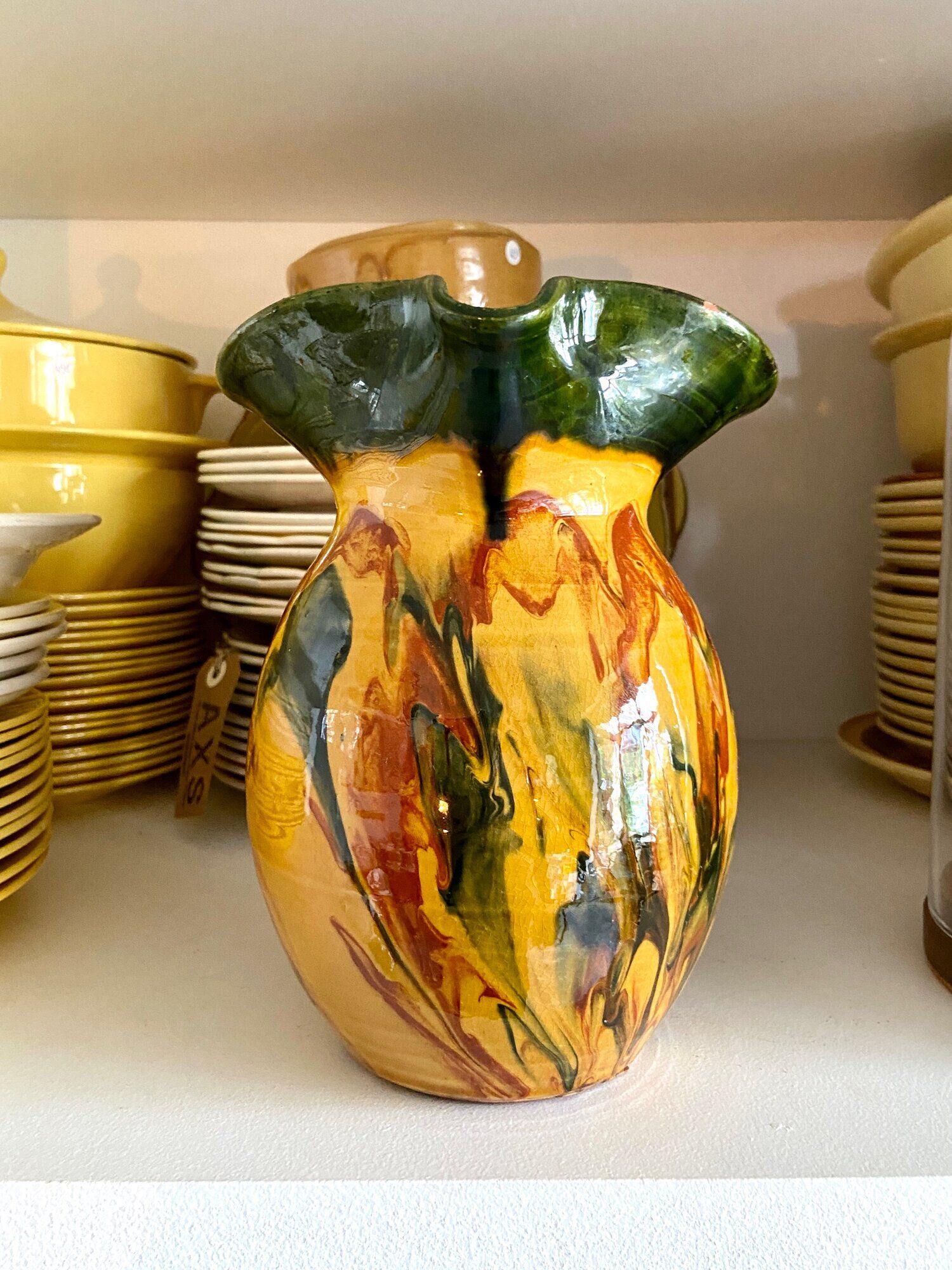 Glazed ceramic pitcher