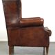 Large sheepskin wing chair with excellent colour and great seating comfort