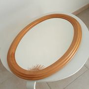Vintage oval mirror in beech from the 70s/80s.