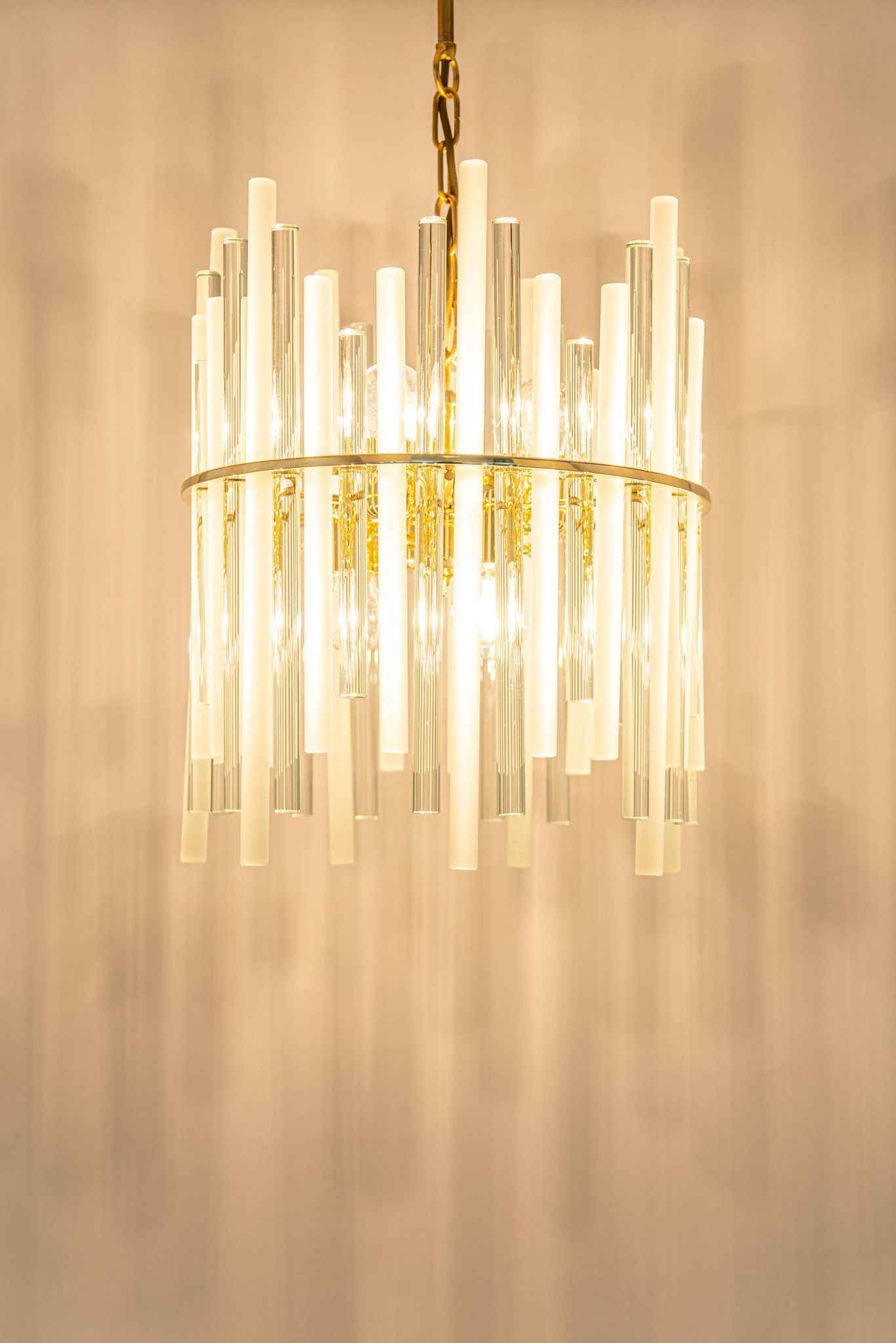 golden brass chandelier with crystal glass rods by C. Palme, Germany, 1970s.