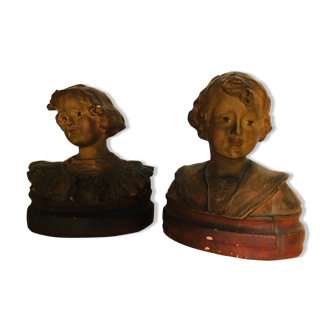 Busts of children in plaster