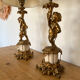 Pair of bronze lamps with puttis