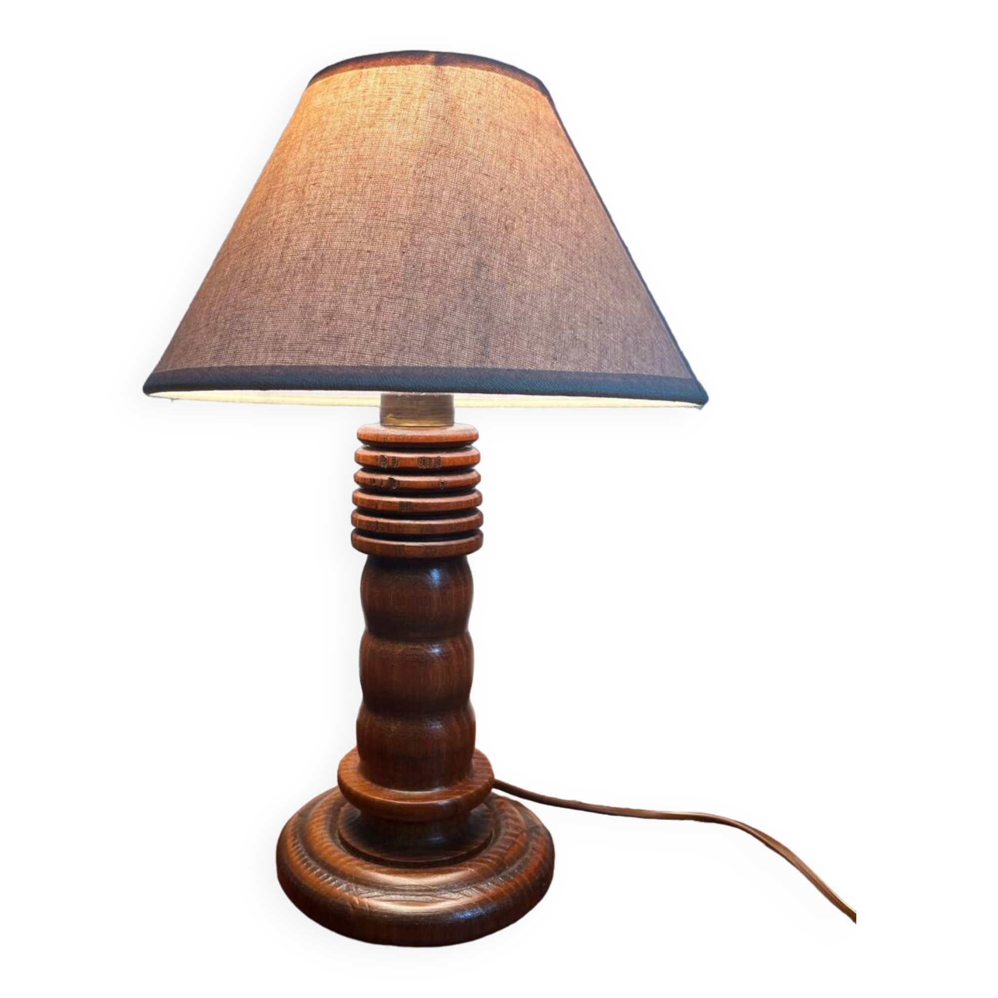 Table lamp with carved wooden base