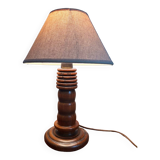 Table lamp with carved wooden base