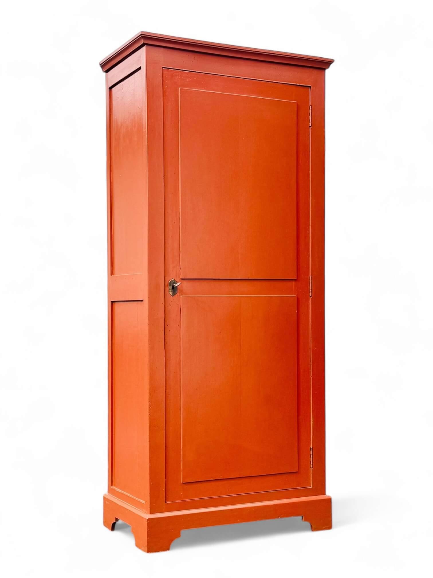 Old terracotta-colored bonnet maker