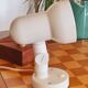 Adjustable wall spotlight in Lita style, off-white enamelled steel.