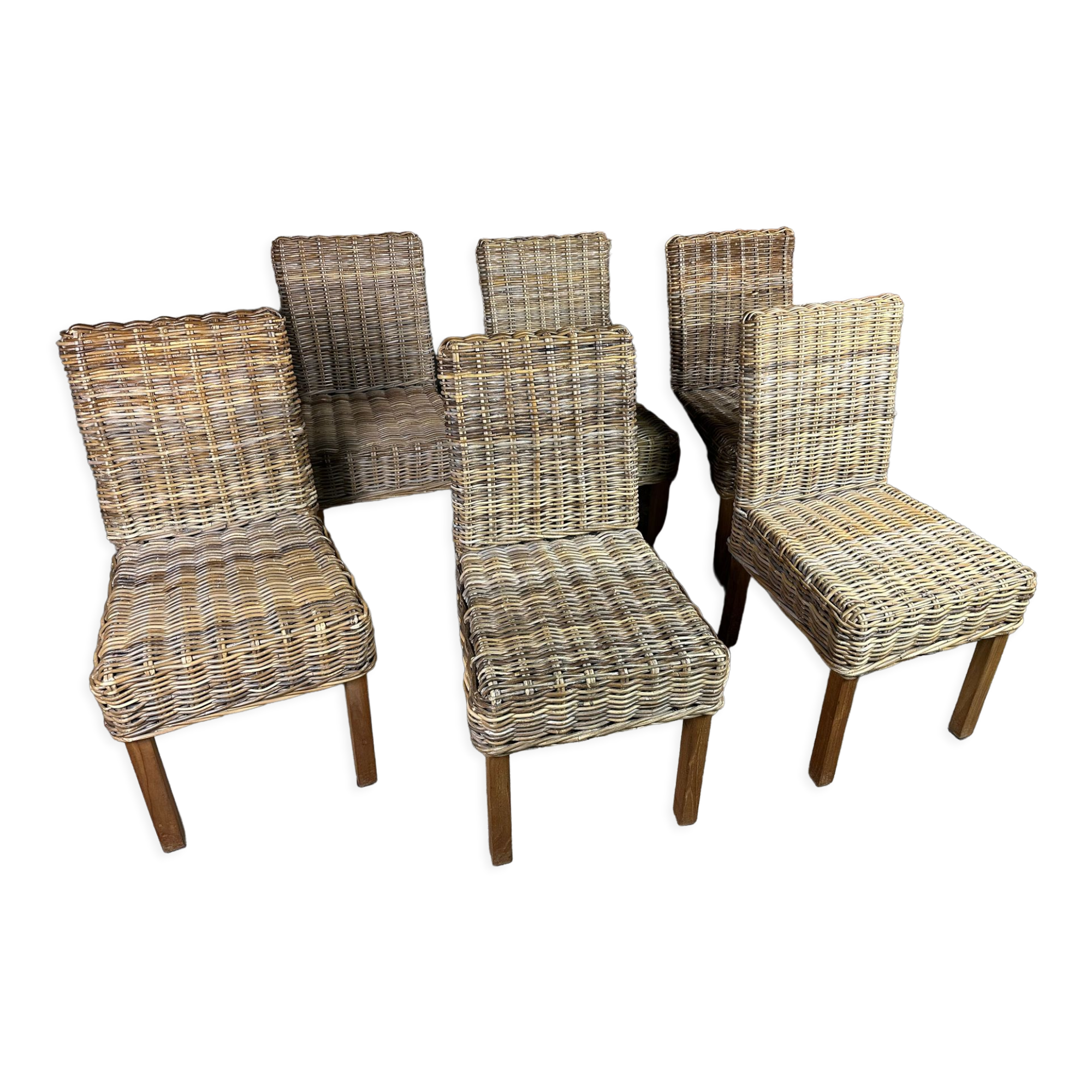 Chairs in wood and woven rattan