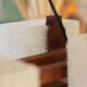 1960s Scandinavian suspension light in teak and perspex.