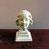 Plaster head of young girl from the 1930s