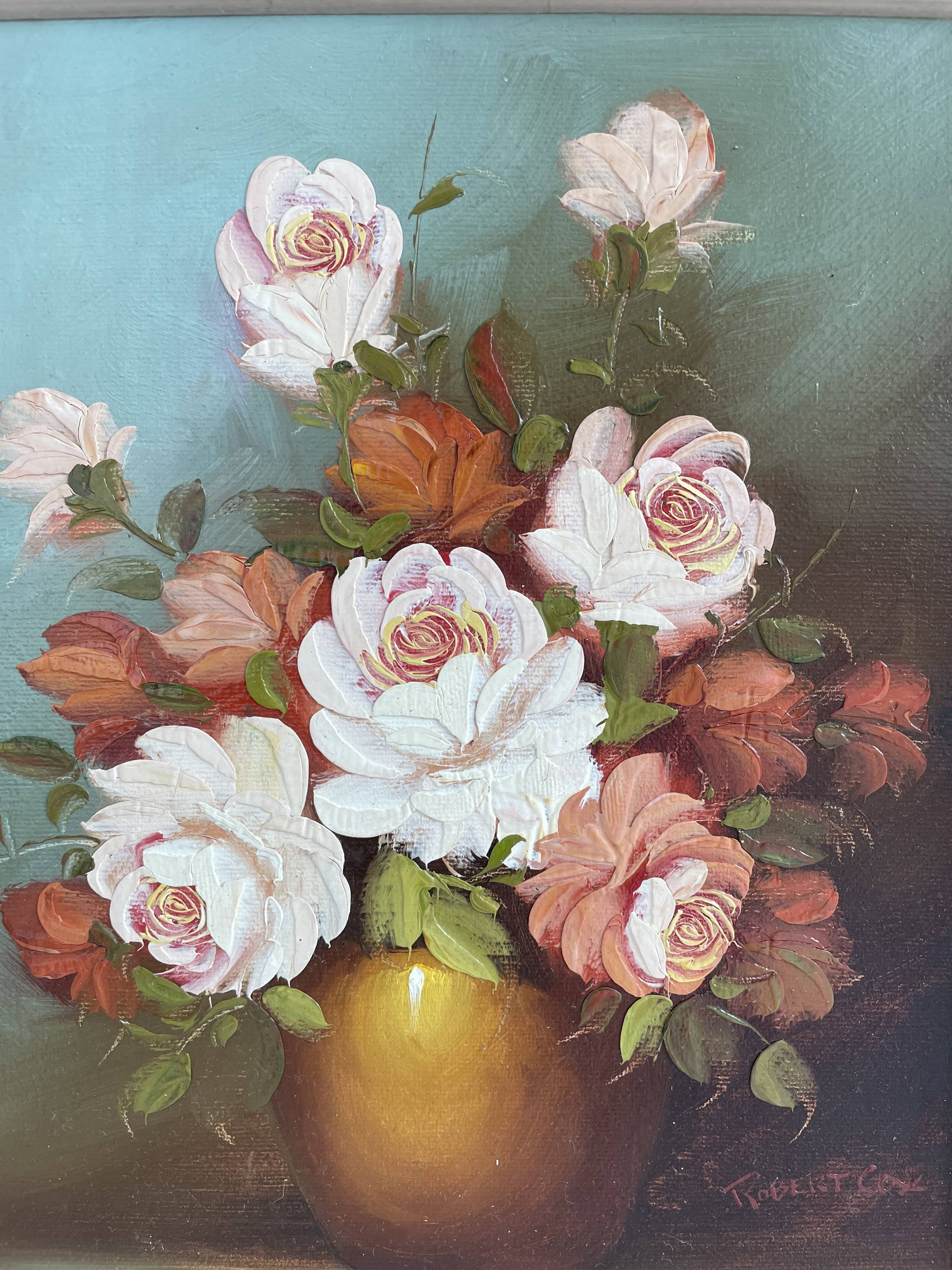 Pair of oils on canvas signed by Robert Cox, floral still lifes.