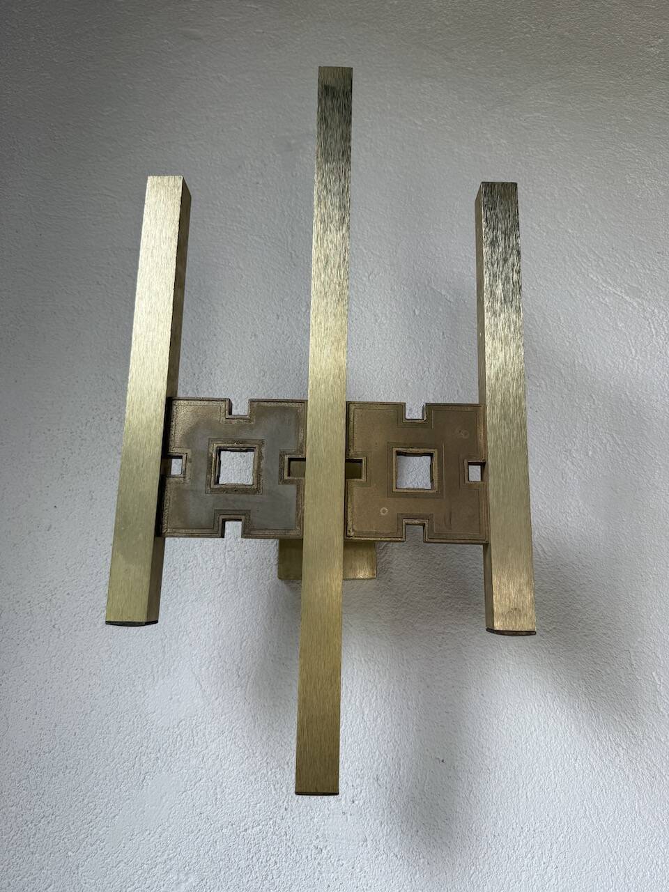 Pair of Regency brass wall lights in Italy