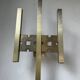 Pair of Regency brass wall lights in Italy