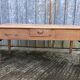 Antique solid cherry farmhouse table with 3 drawers and 1 pull out.