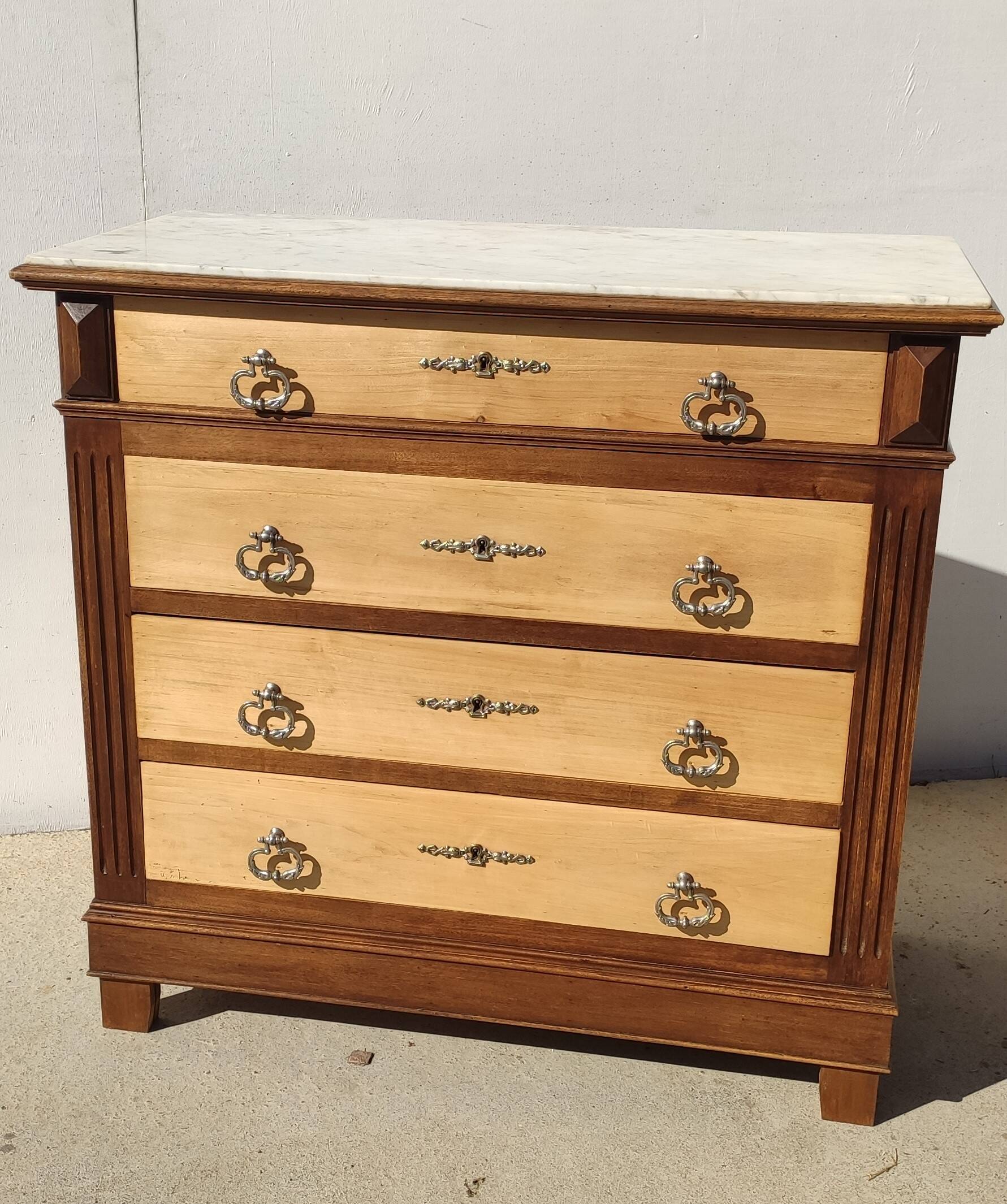 Old chest of drawers, white marble top.