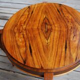Table basse art déco de forme ronde en palissandre de rio.