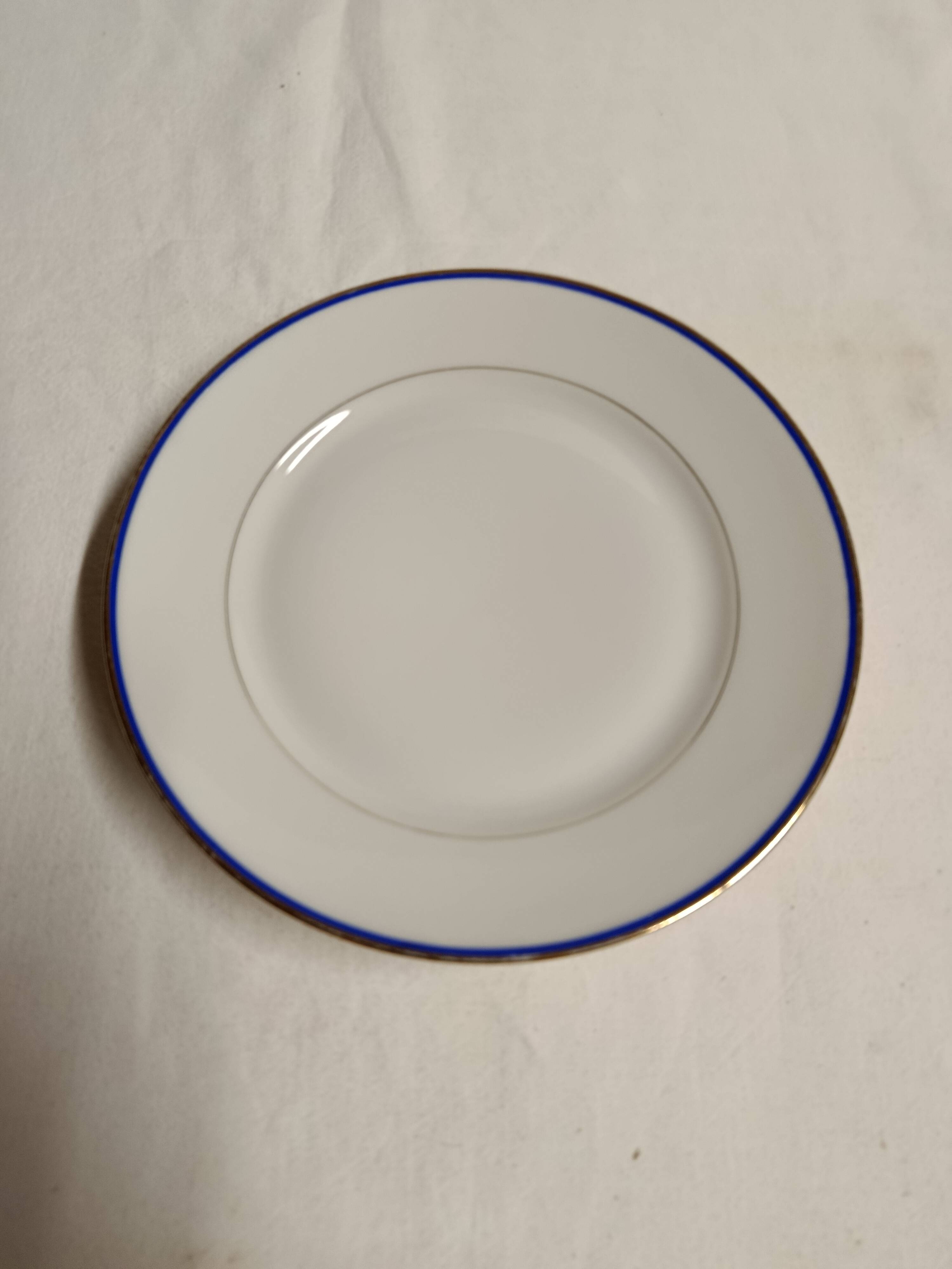15 assiettes en porcelaine de Limoges