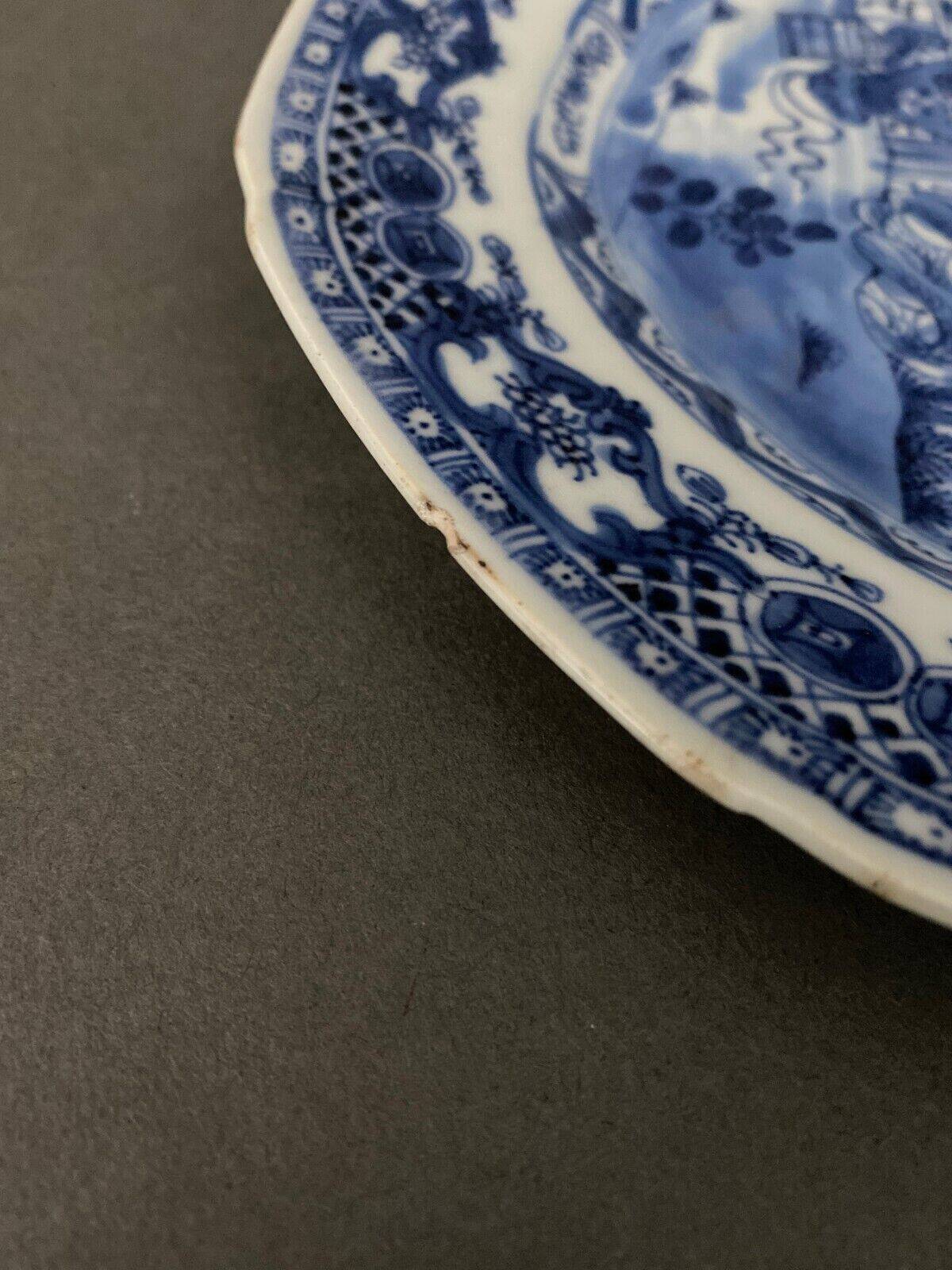 Blue and white China plate decorated with butterflies late 19th century