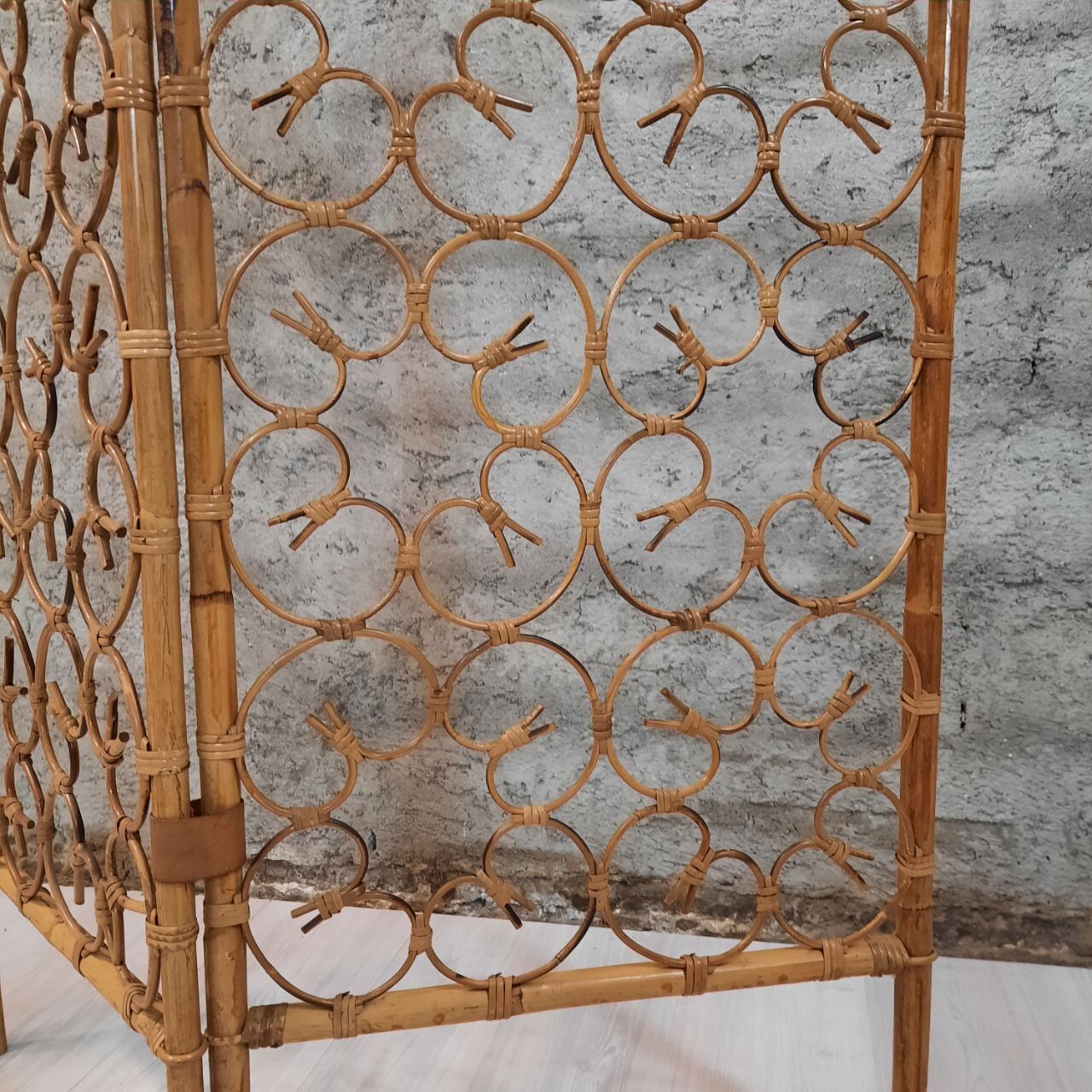Vintage screen made of bamboo, wicker and leather