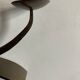 Pair of modernist candlesticks in beaten iron 1970