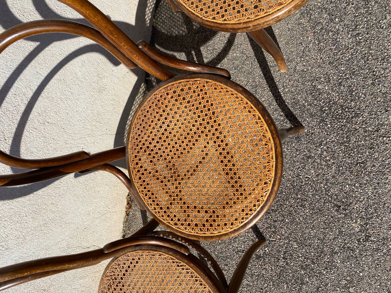 Set of 4 wooden and cane bistro chairs