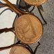 Set of 4 wooden and cane bistro chairs