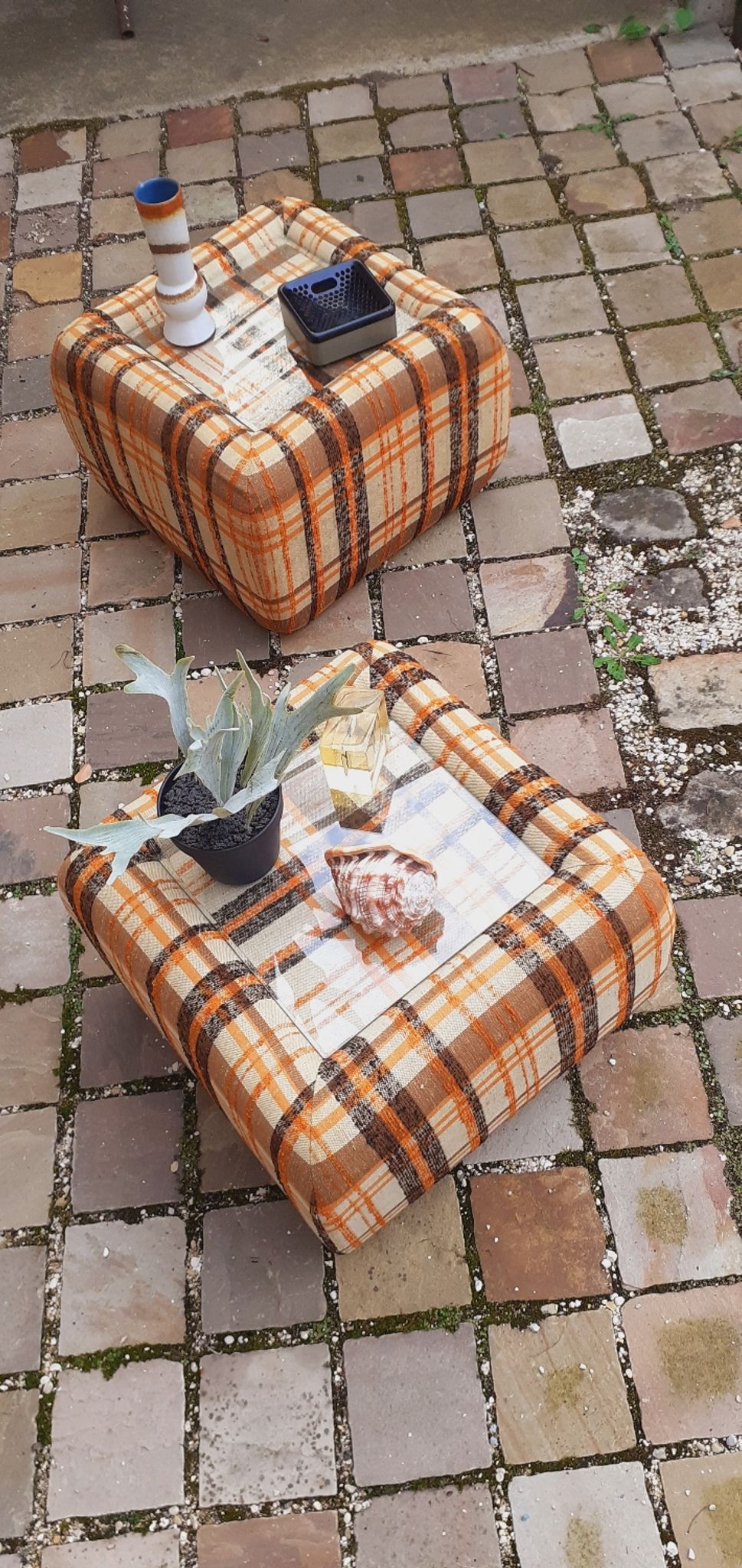 Pair of vintage 70s fabric coffee tables with glass tops