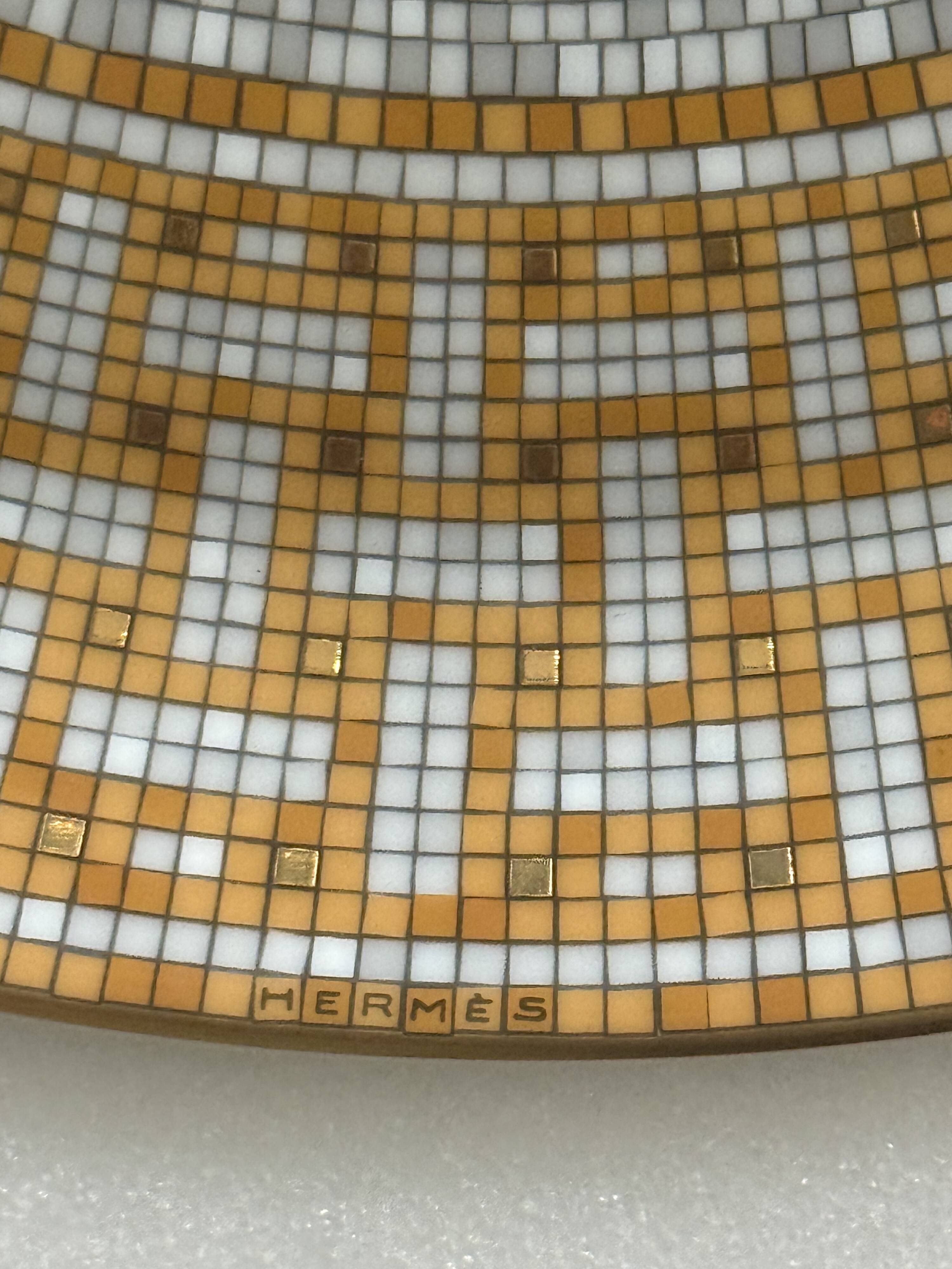 Mosaic tart dish in 24-carat gold by Hermès