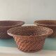 Trio of vintage woven rattan and wicker baskets