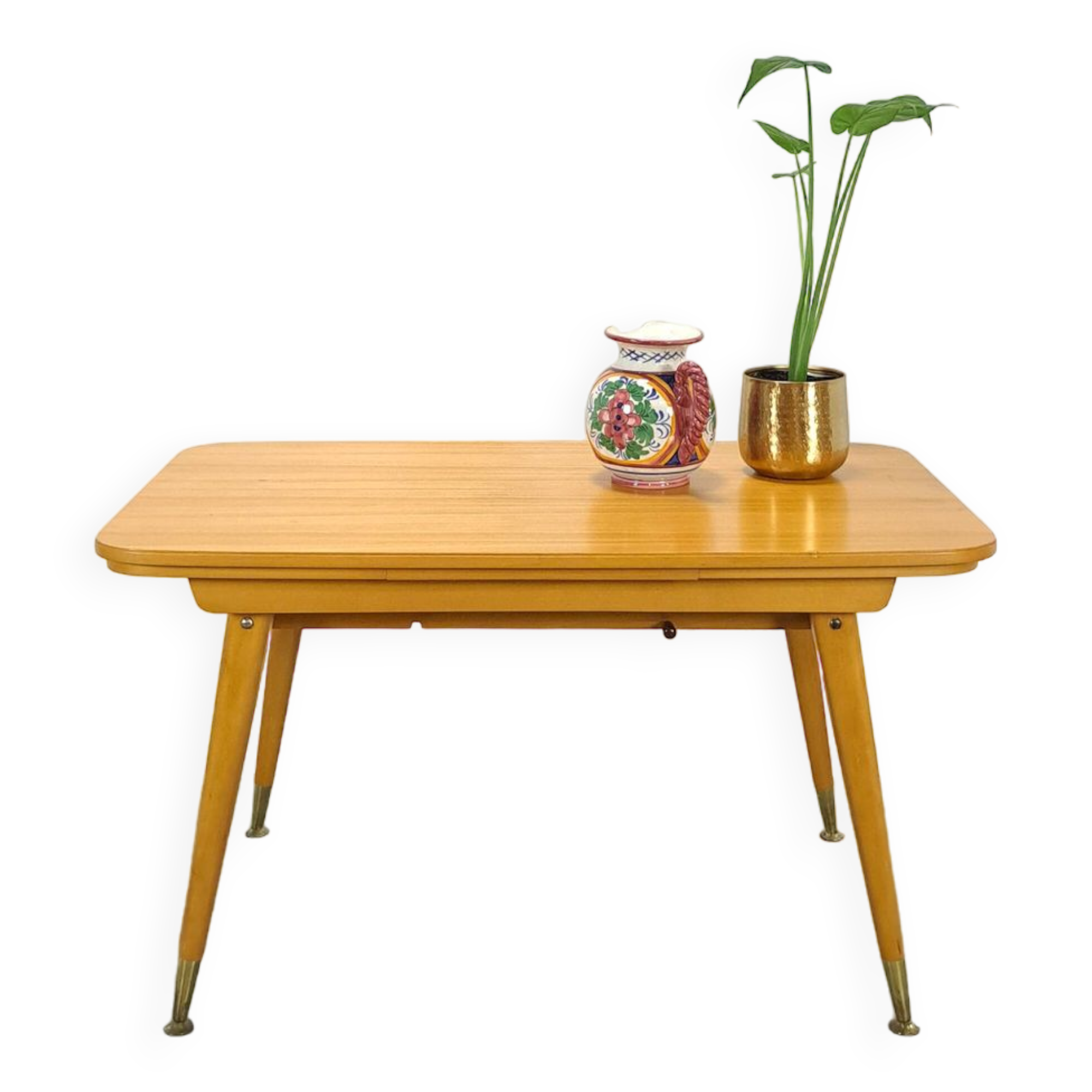 Vintage veneer table with pretty angular legs and brass at the base of the legs.