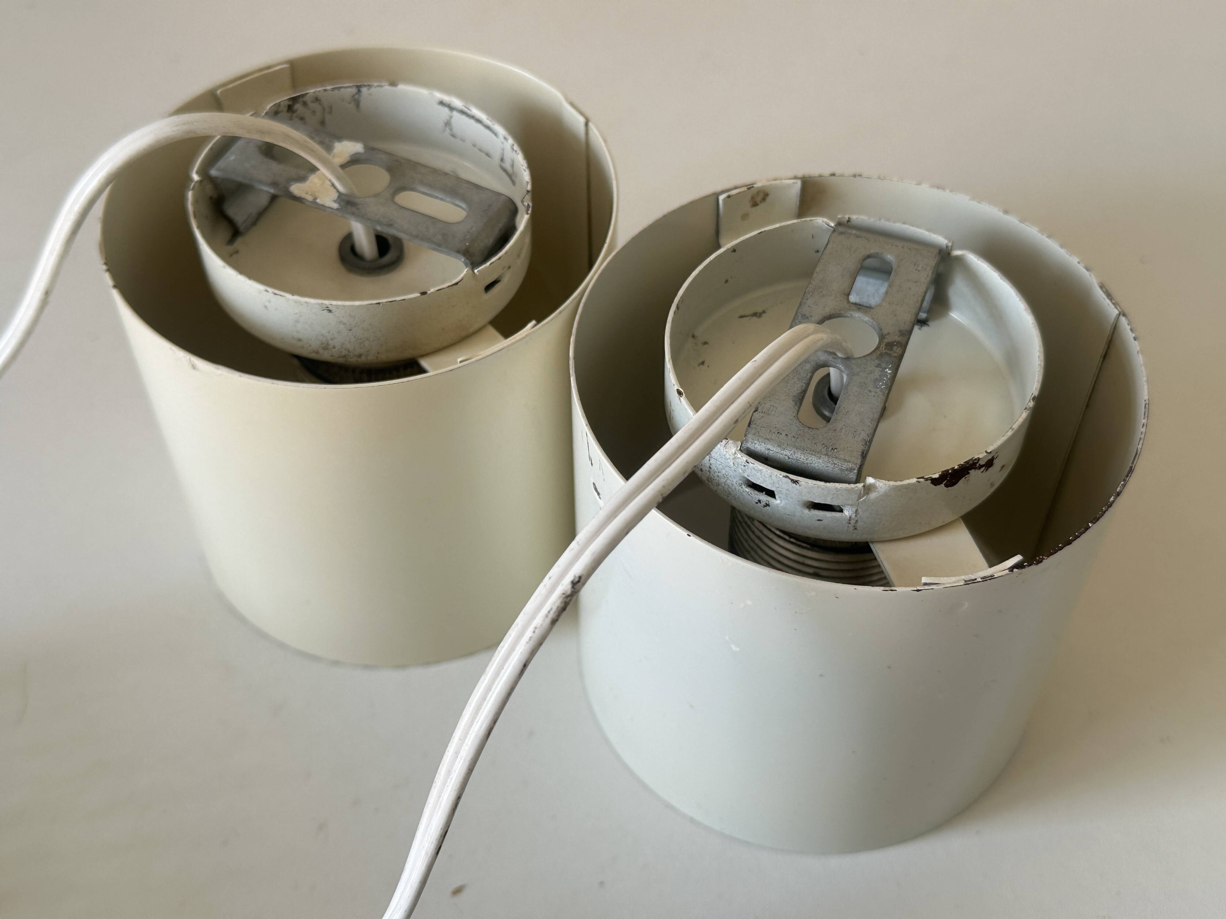 Pair of vintage design spring lamp wall lights from the 70s